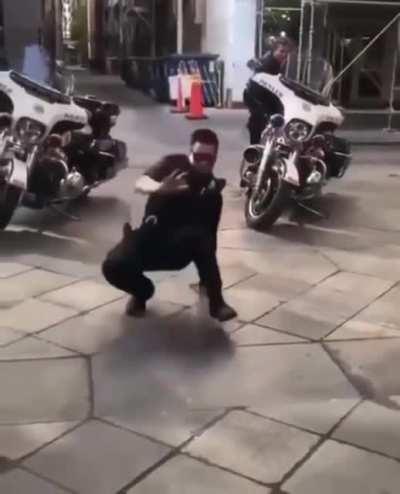 Hip hop battle between this kid and the cop