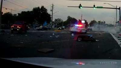 Wild crash during police chase.