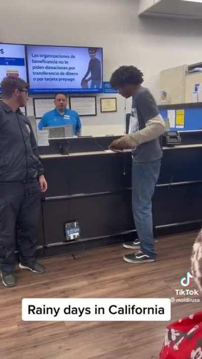 A manchild throws an extreme fit at a Walmart in California after his check was denied by the employees at the Money Center.