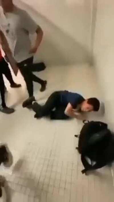 Kid Gets His Head Slammed Into the Bathroom Wall