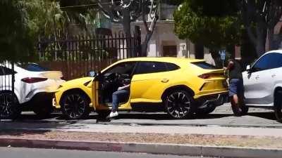 Ben Affleck leaves his son in the car while he goes out to answer a phone call, kid gets in the driver's seat & hits the car behind him