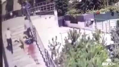 Businessman catches a glass panel falling from 15th floor while walking with his wife