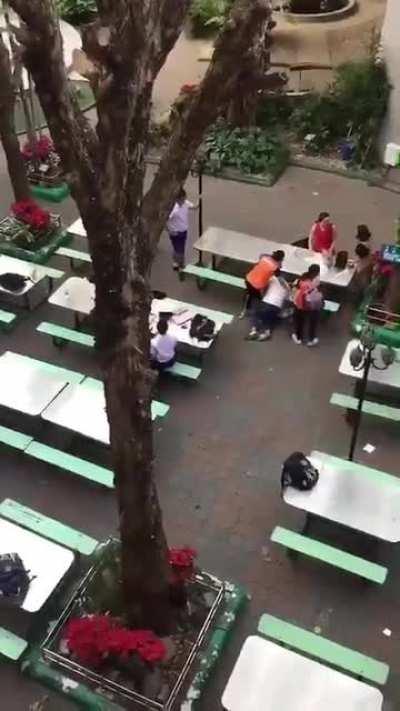 A kid hit back at a woman alongside “joy to the world” music intro.