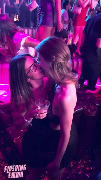 Drunk girls tongue kissing in the club