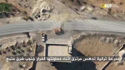A wounded SNA fighter is ran over by an APC following an SDF drone attack near Manbij, Syria