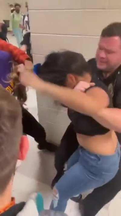 girl in back pulled out laptop to film