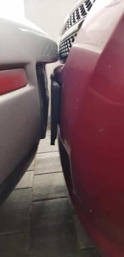 My dad parking his car car behind mine