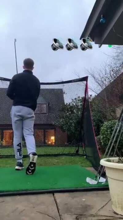 WCGW practicing golf in the backyard