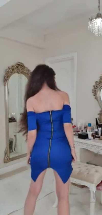 Popping Out of Her Dress in Style