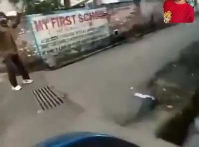A scooty guy crazily drivingand hits a cycle guy
