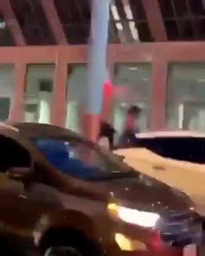 Protestor takes Chicago police horse for a ride.