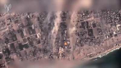 Footage shows Hamas launching rockets from Al-Shati refugee camp in Northern Gaza, IDF strikes the site. 