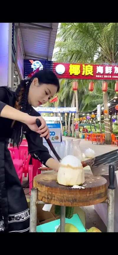 Her coconut cutting skills