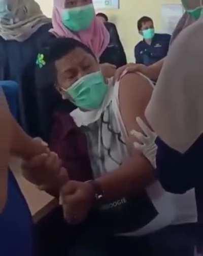 To relax his arm so it doesn't hurt