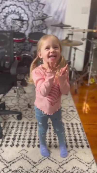 Dad mixes metal for daughter