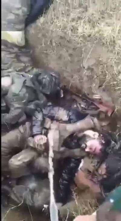 RU POV - Ukrainian pissing on Russian corpses [GRAPHIC]