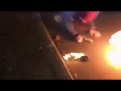 Portlands resident Antifa Clown 'Fire Shoes' does a dance for the crowd