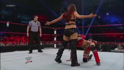 Nikki Bella taking Layla down