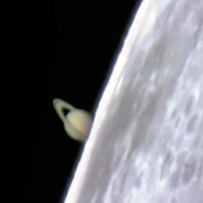Incredible footage of Saturn rising from behind the Moon during a lunar occultation.