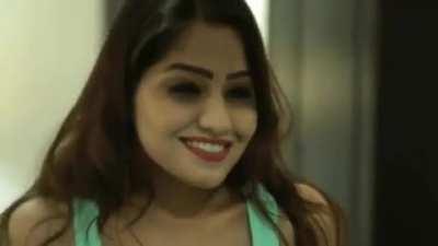 Simran kaur posing in a tank top.