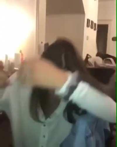 To kick a can off her head