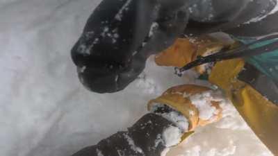 Situationally aware skier saves the life of snowboarder stuck upside down in the snow (NSFW: language)