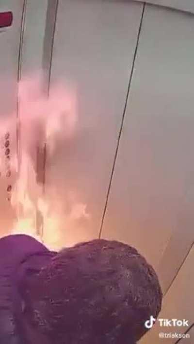 Idiot lighting drink in elevator