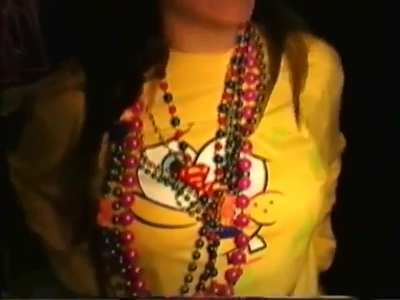 Mardi Gras girl accepts a stranger's offer to suck her tits