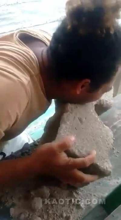 Biting a cinder block