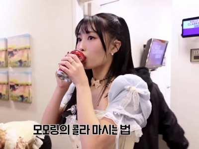 230428 - Momo enjoying a Coca-Cola