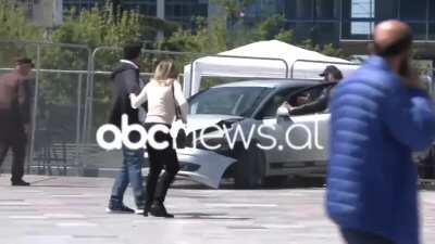 Center of Tirana, a high driver in drugs attemps to kill people( 0 injuries) . A hero with flying kick stops him