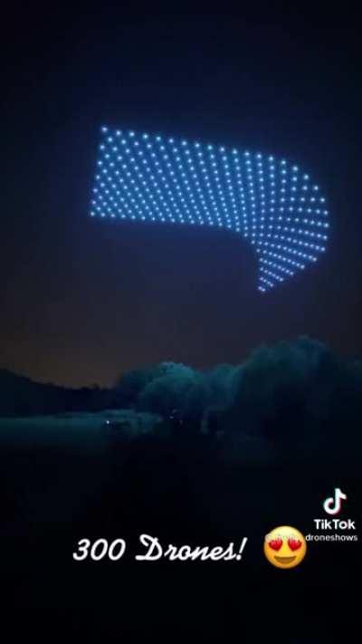 Trippy drone lightshow in the night sky