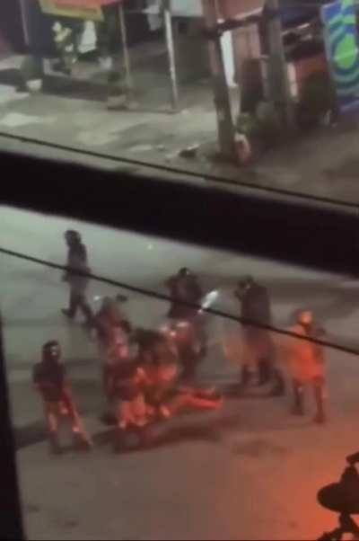 police brutally kicked a fallen protester on his stomach.