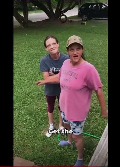 Woman goes apes**t… gets the hose.