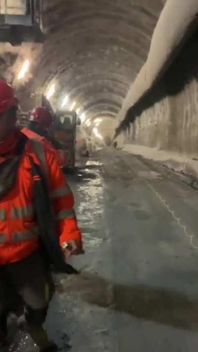 The shockwave from a controlled detonation traveling down this tunnel