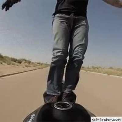 Performing circus on a moving bike