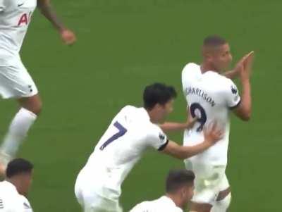 Heung-Min Son pushing Richarlison towards the South Stand