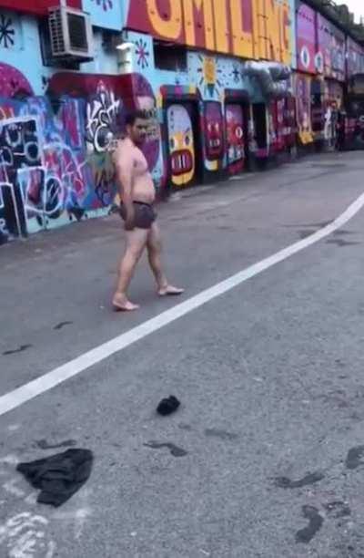 Jumping over a trash can into a river