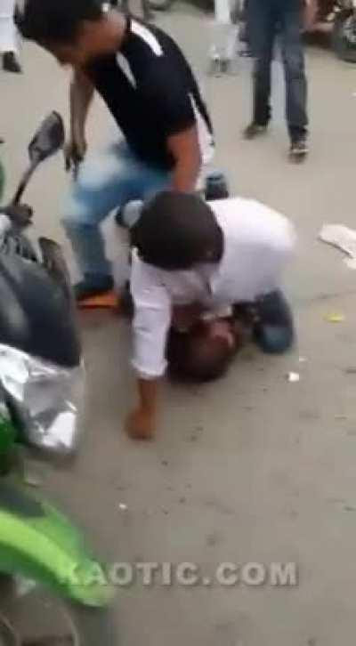 Absolute mad lad tackles a machete wielding lunatic and stops him from attacking people