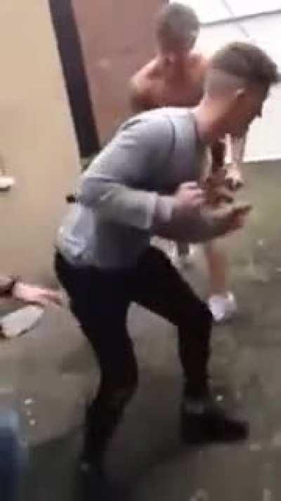 Trying to break a chair with your back.