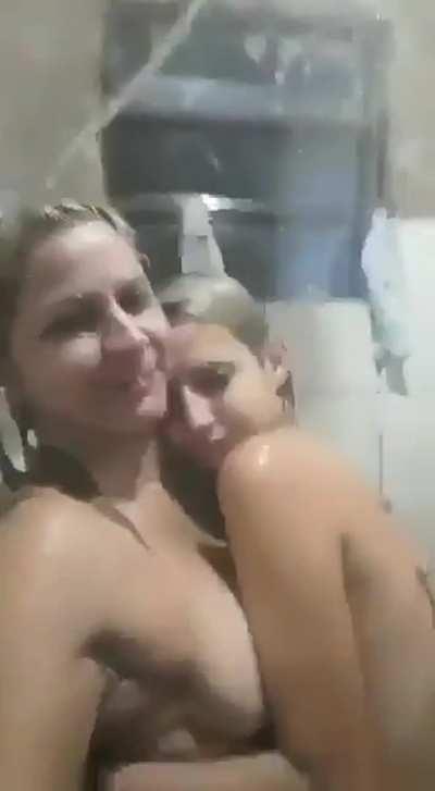 Mother and daughter in the shower