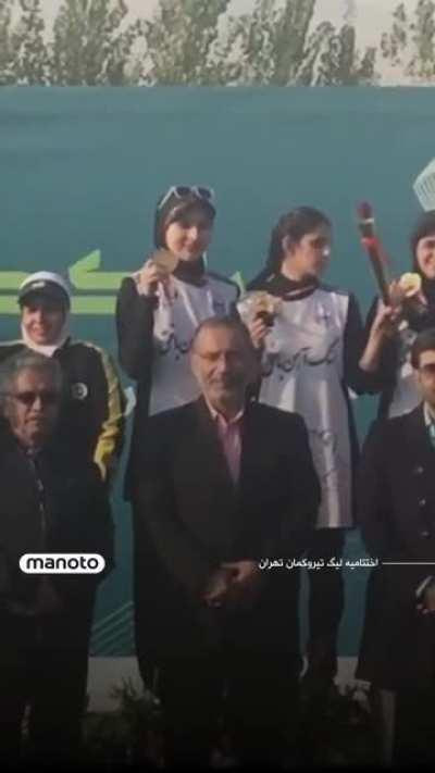 Iranian athlete removes her mandatory hijab during the official award ceremony in Iran