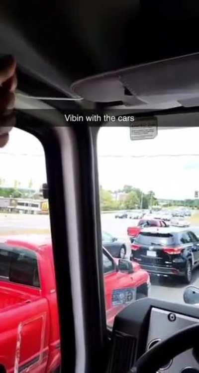 Vibin' with the cars.