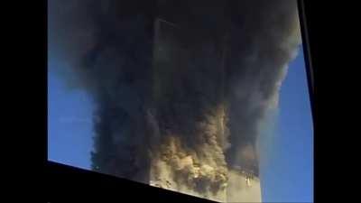 Different perspective of 2WTC collapsing on 9/11. Slow mo replay at the end.