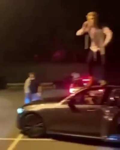 Jumping off friend's car roof
