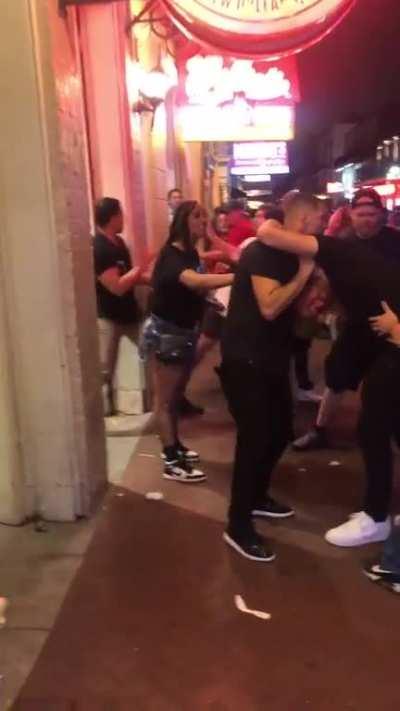 Nate Diaz with the standing guillotine choke during a street fight. Skills pay the bills!