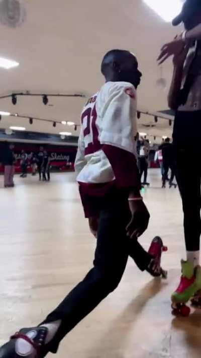 Roller skating up to a couple ladies