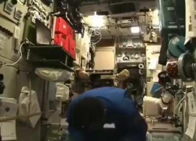 Muslim Malaysian Astronaut offering Salah in the space-station floating over Earth’s atmosphere.