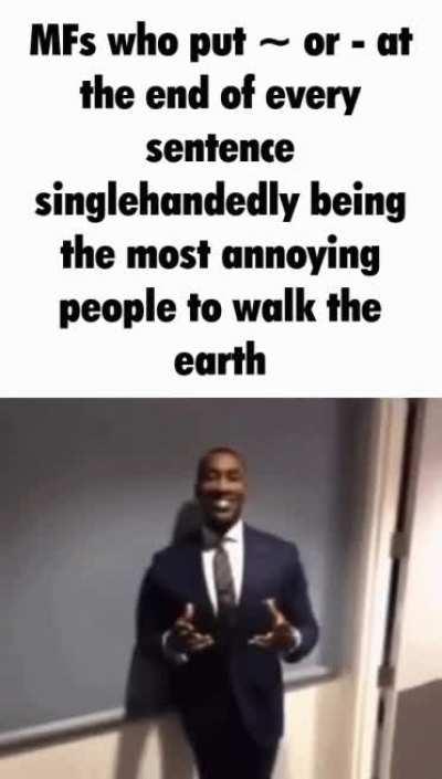 Black guy posing in nice suits