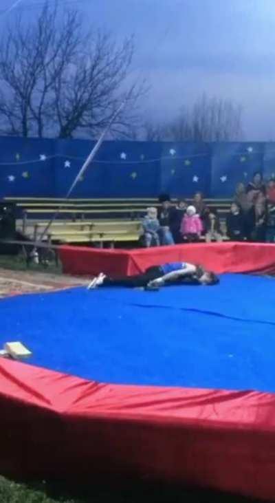 Snake handler gets his neck crushed in front of his audience while performing.